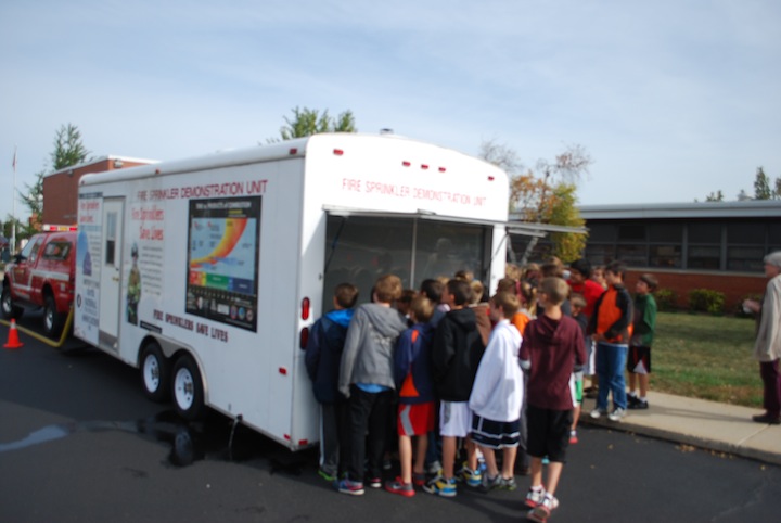 Countryside FPD uses a fire sprinkler demonstration trailer to educate school-aged children about fire sprinklers.